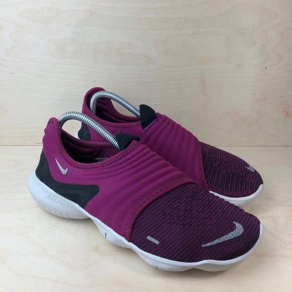 nike running free run flyknit trainers in berry